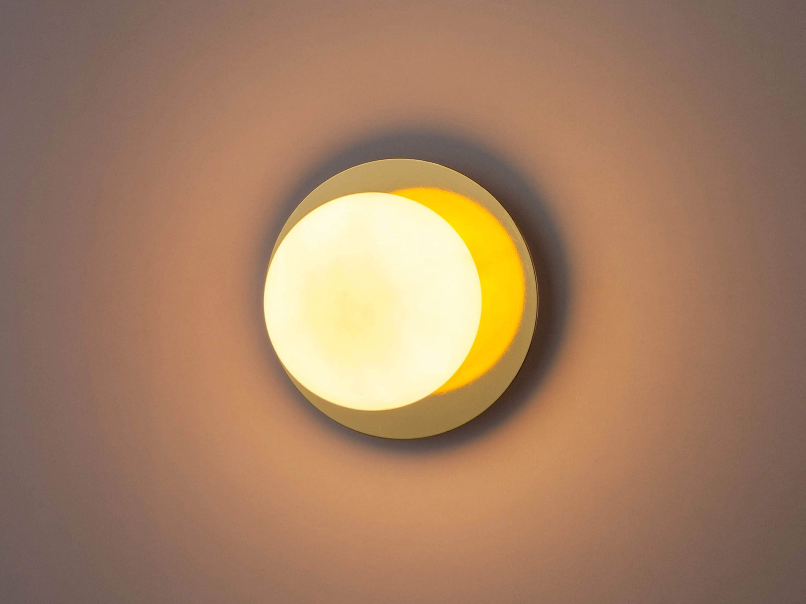 Brass opal disc wall light