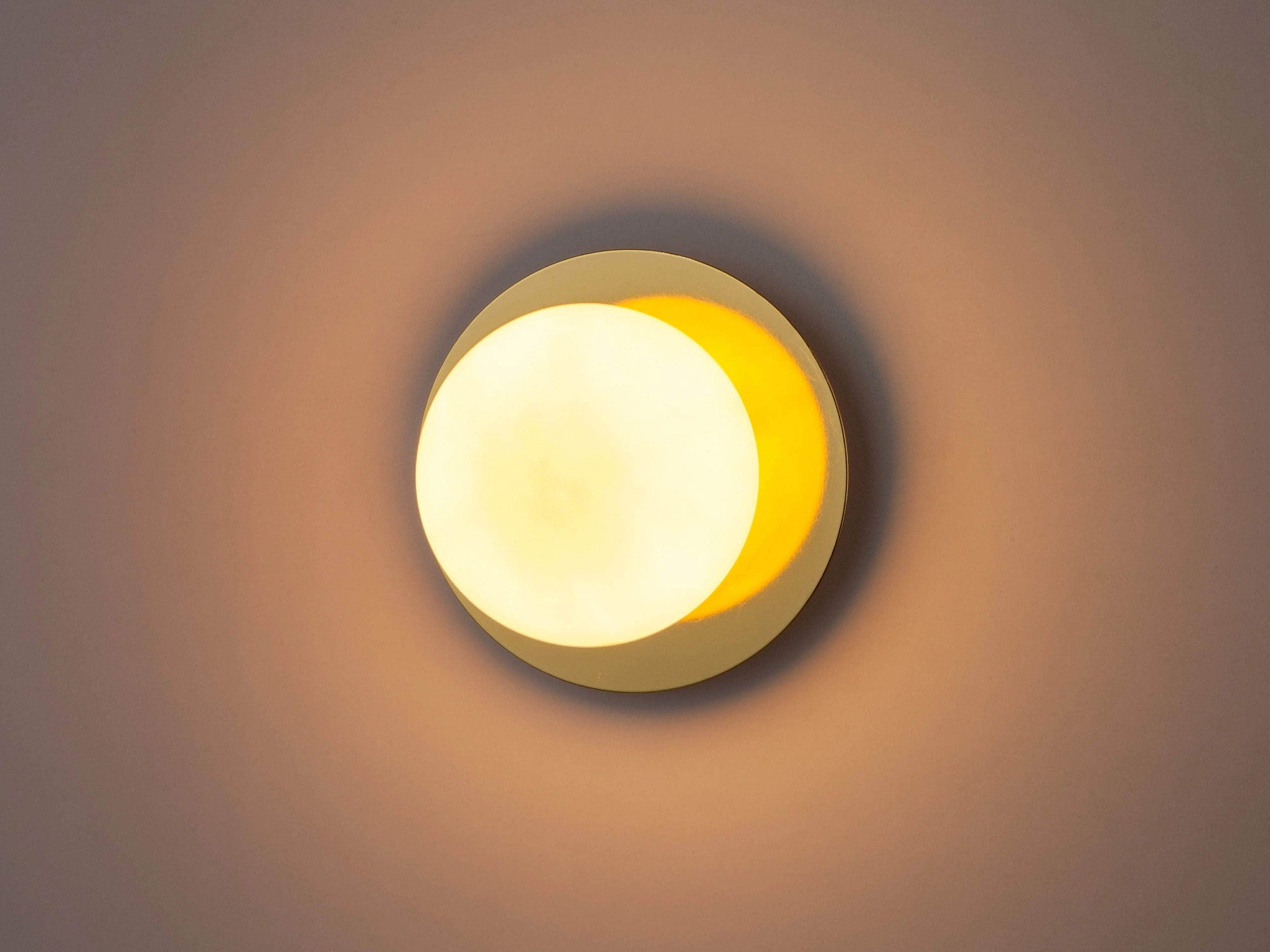 Brass opal disc wall light