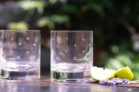 A Pair of Crystal Whisky Glasses with Stars Design