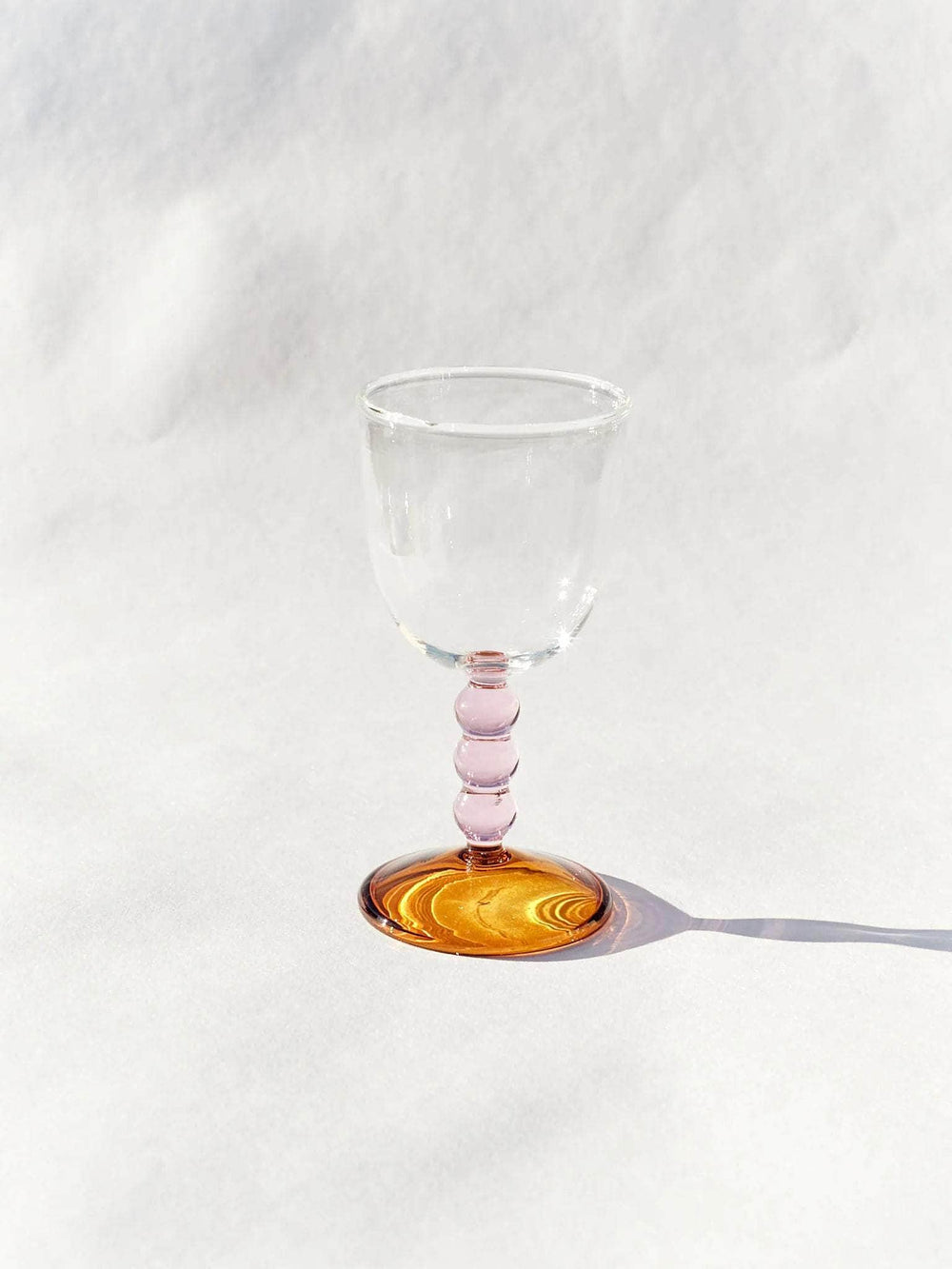 Hand Blown Circle Stem Wine Glass in Pink/Amber