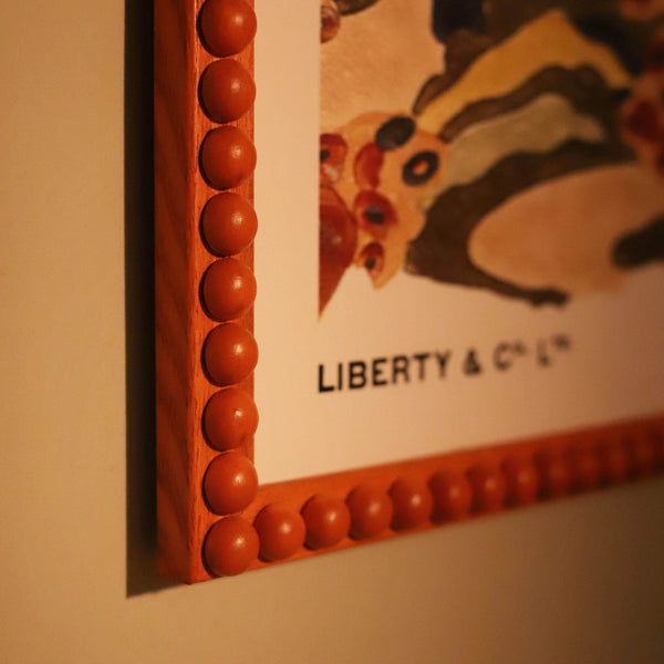 Burnt Orange Stained Bobbin Frame