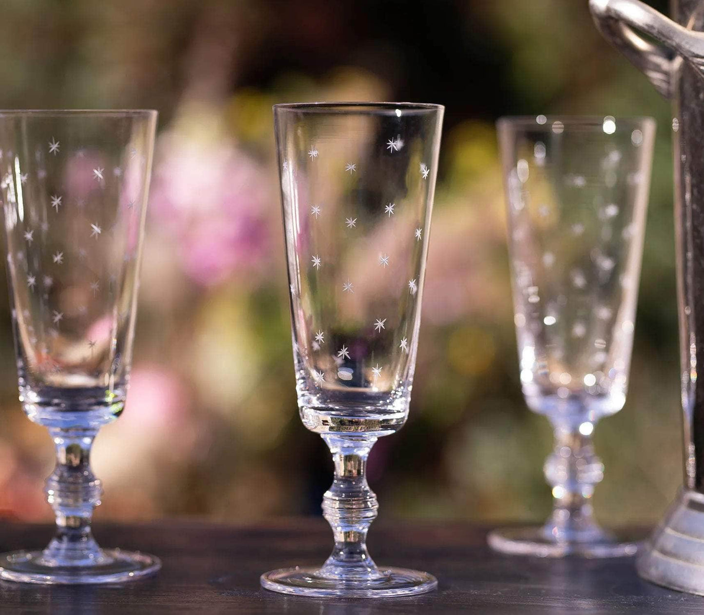 Load image into Gallery viewer, A Set of Four Crystal Champagne Flutes with Stars Design
