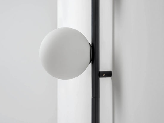 Charcoal grey bar opal ball wall light