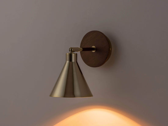 Brass cone wall light