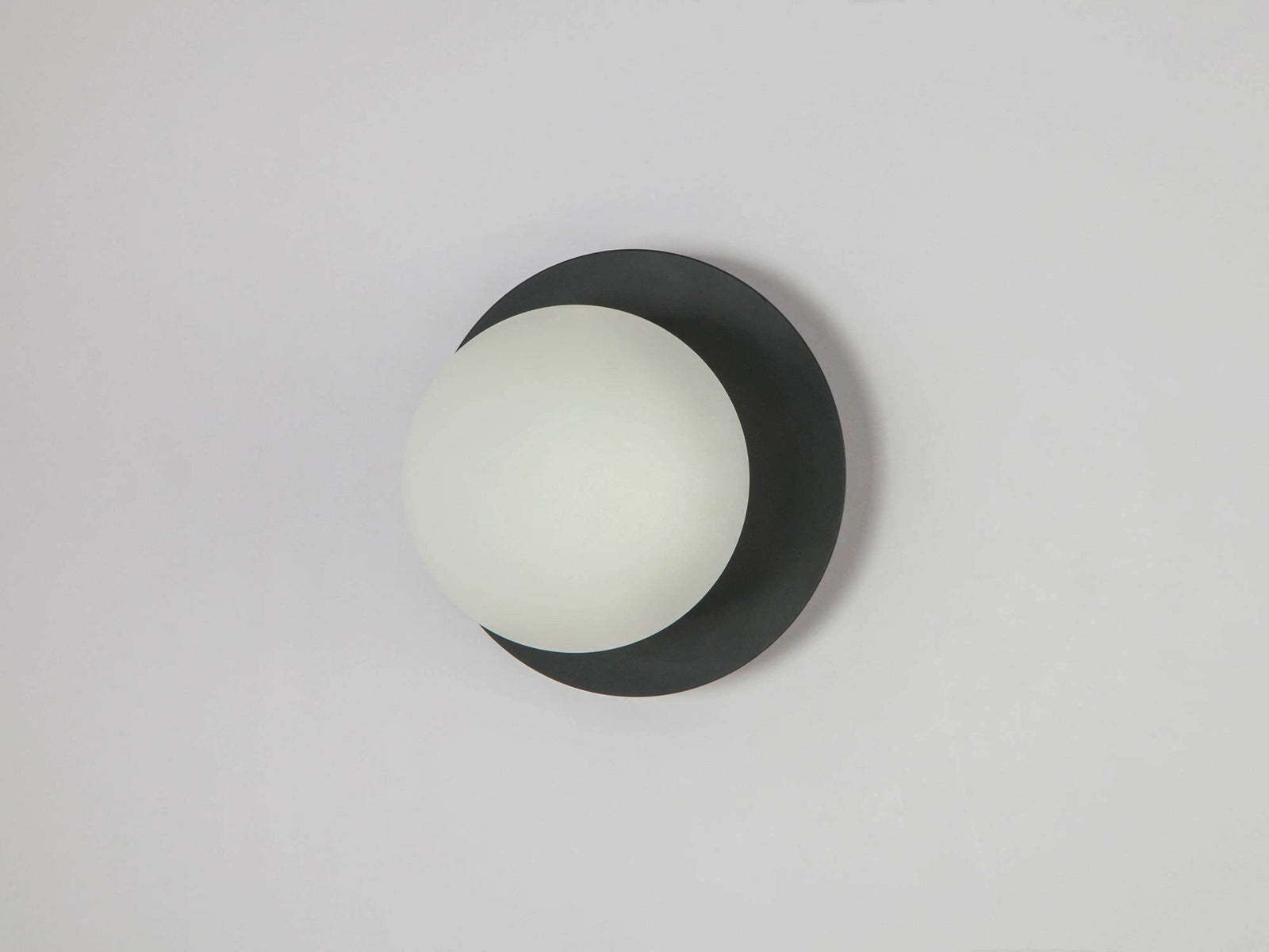 Charcoal grey opal disk wall light