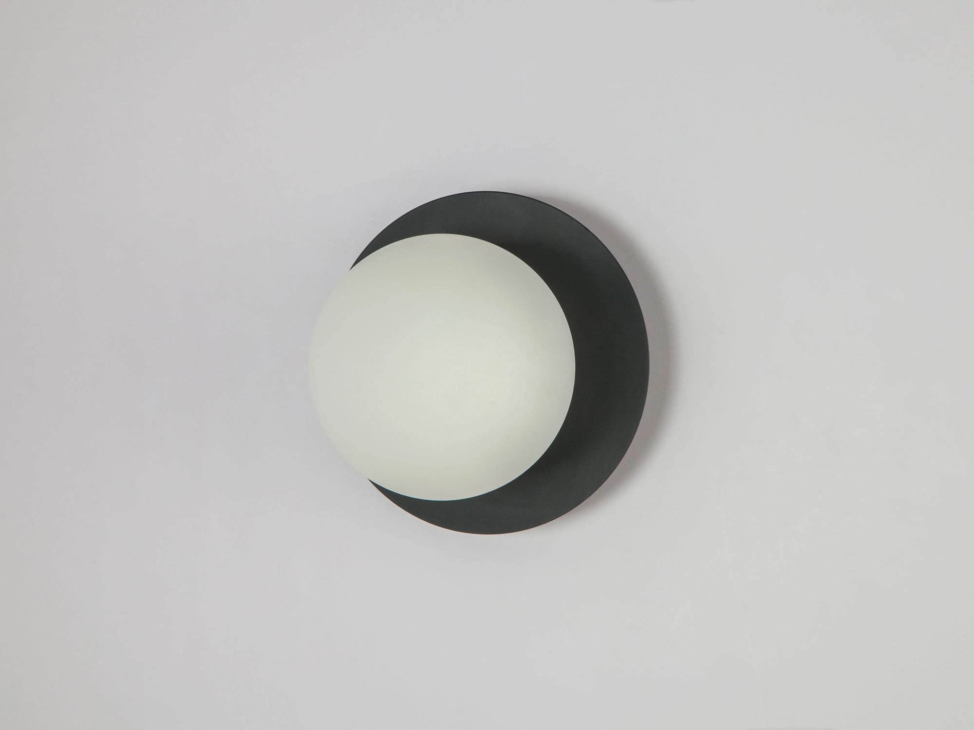 Charcoal grey opal disk wall light