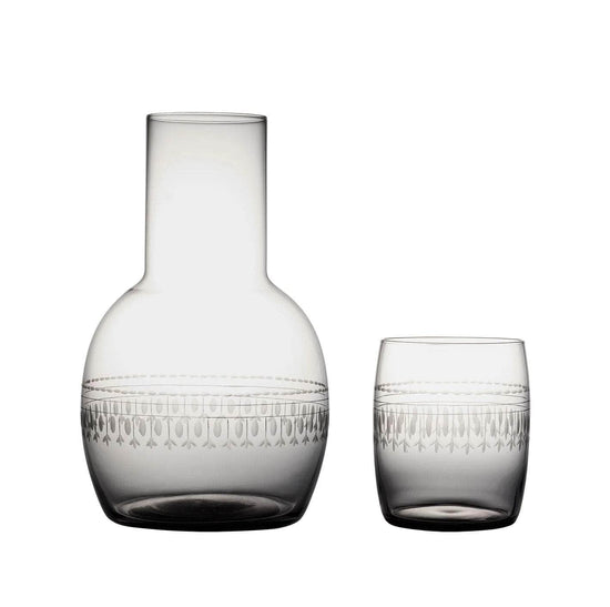 A smoky crystal carafe set with ovals design