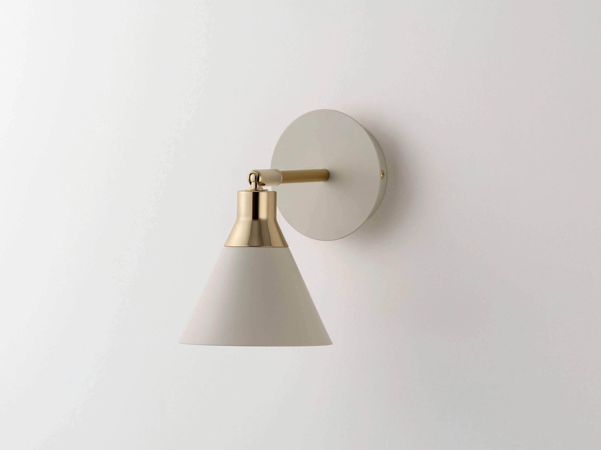 Sand cone wall light