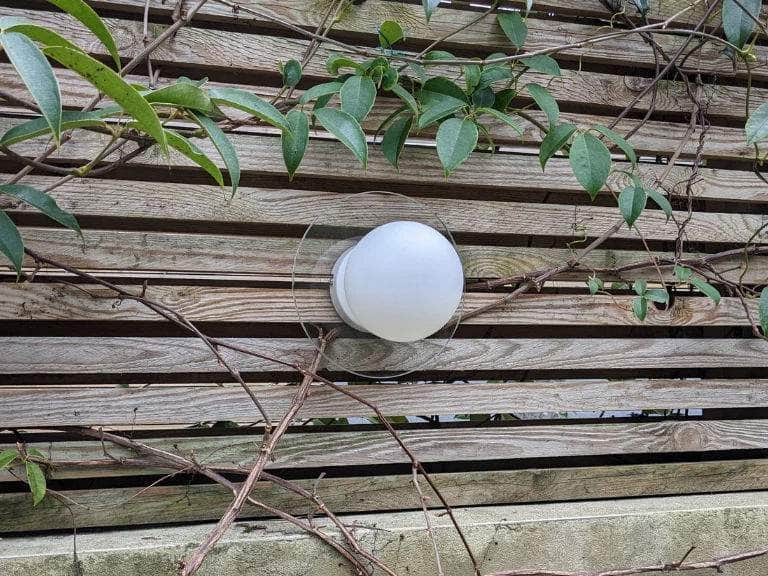 Glass opal disk wall light