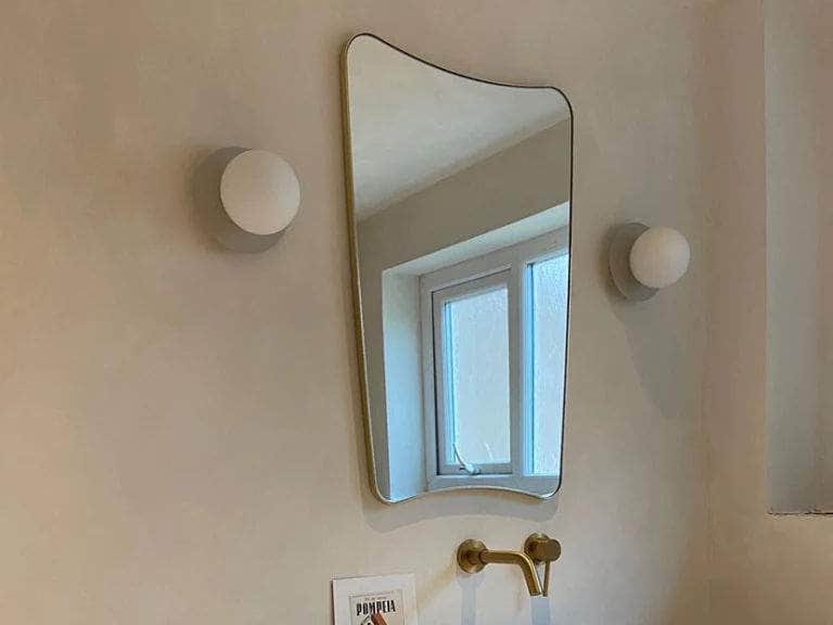 Sand opal disk wall light