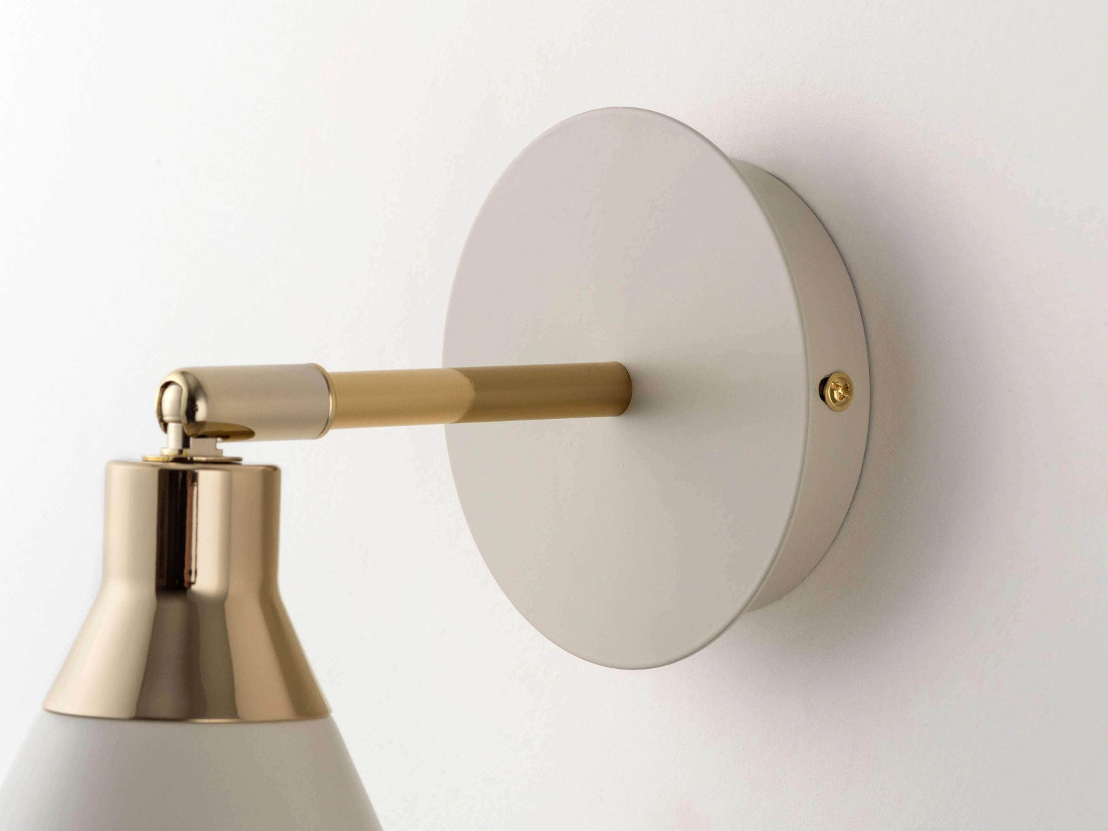 Sand cone wall light