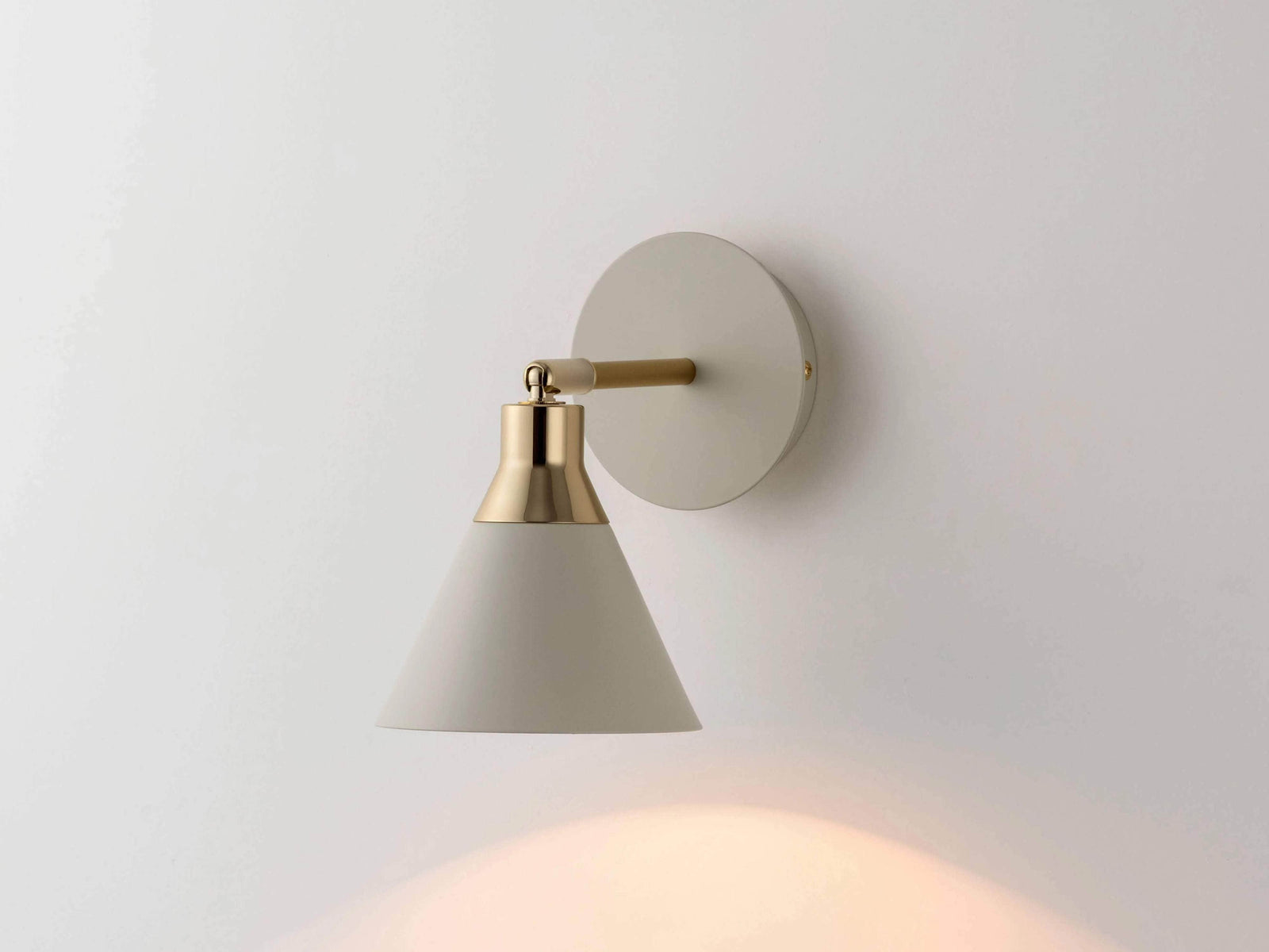 Sand cone wall light