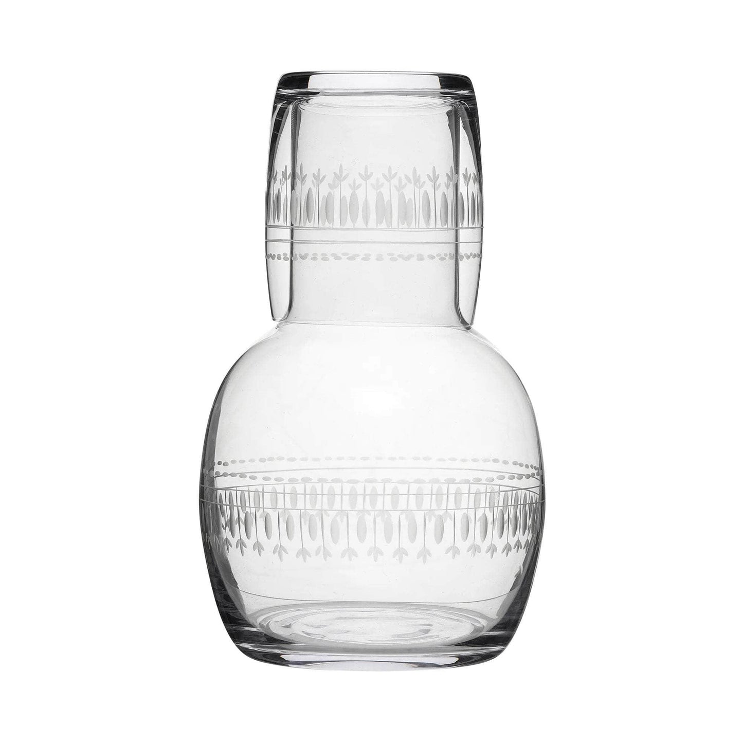 A Crystal Carafe Set with Ovals Design