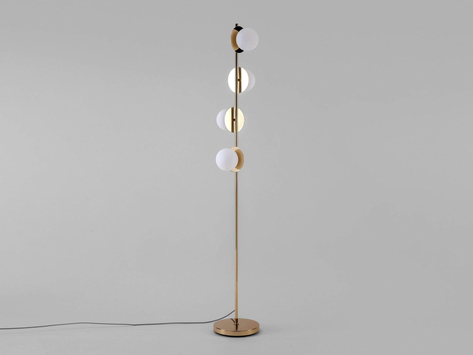 Brass opal disk floor lamp