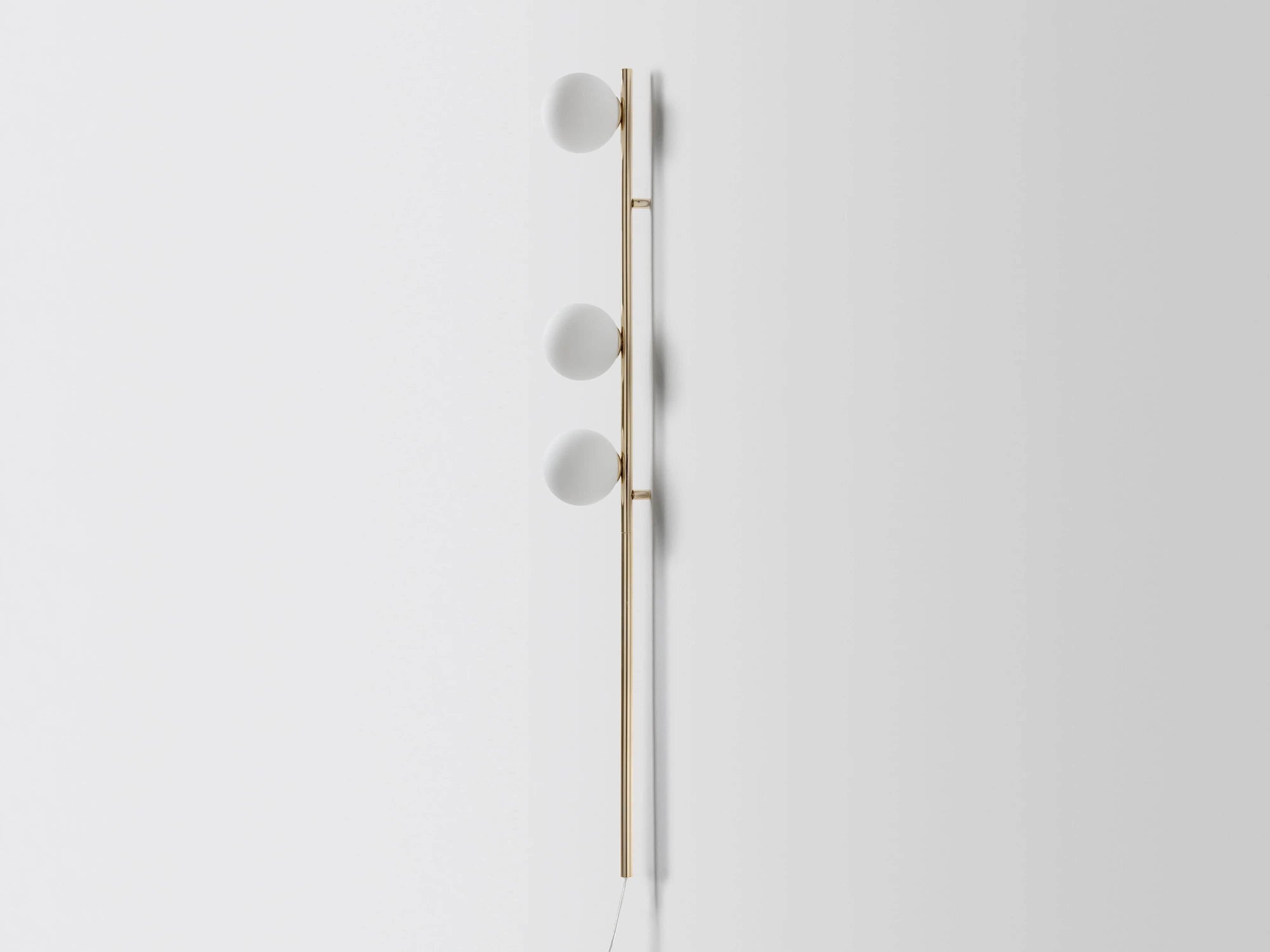 Brass bar opal ball wall light