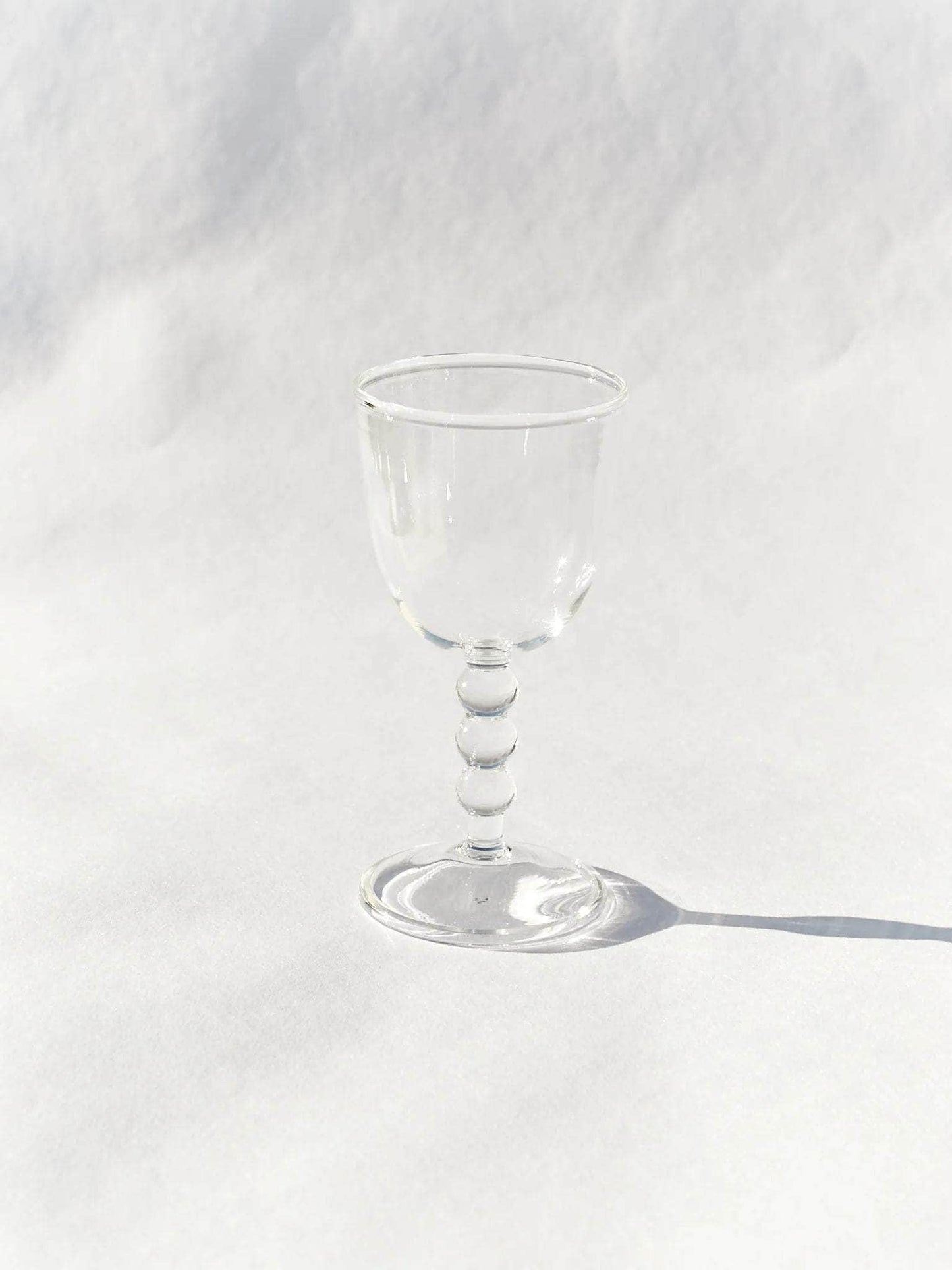 Hand Blown Circle Stem Wine Glass in Clear