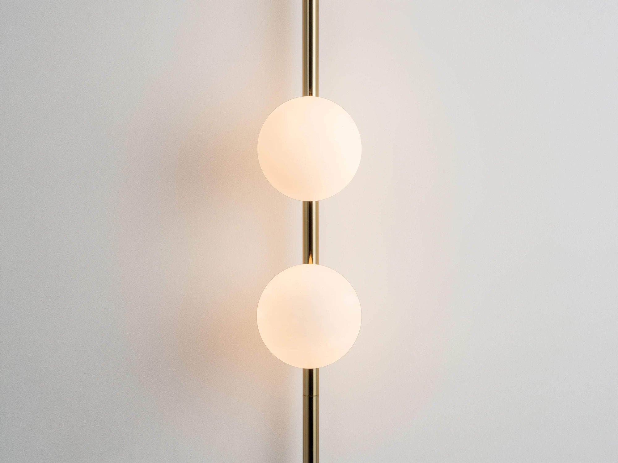 Brass bar opal ball wall light