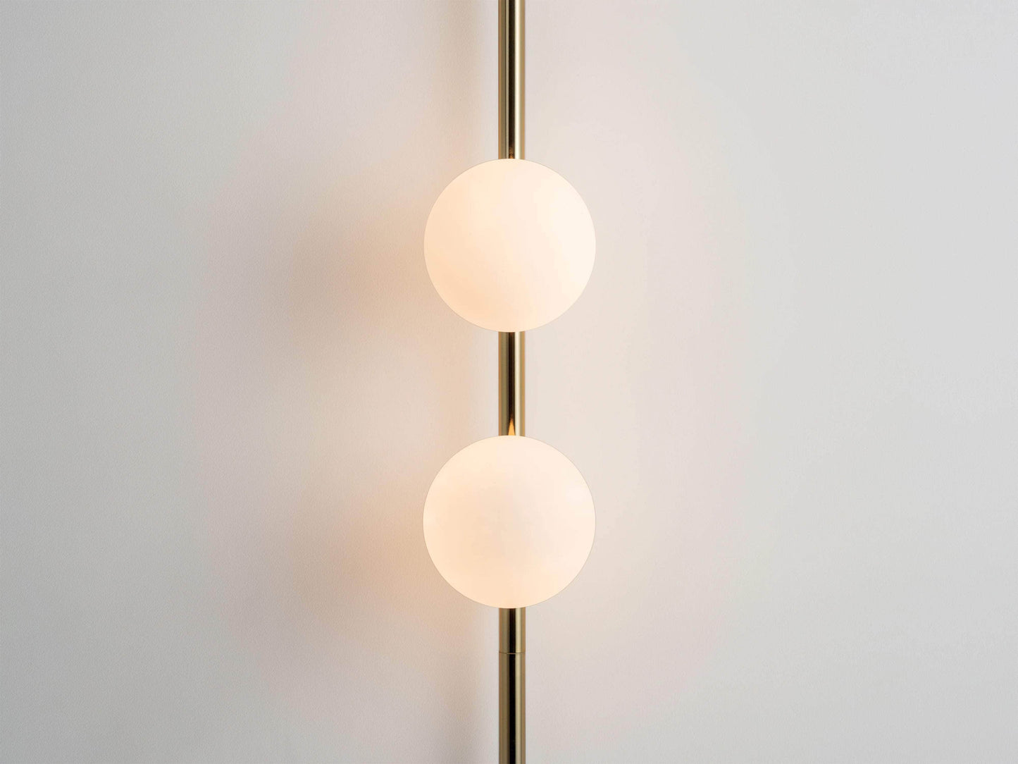 Brass bar opal ball wall light