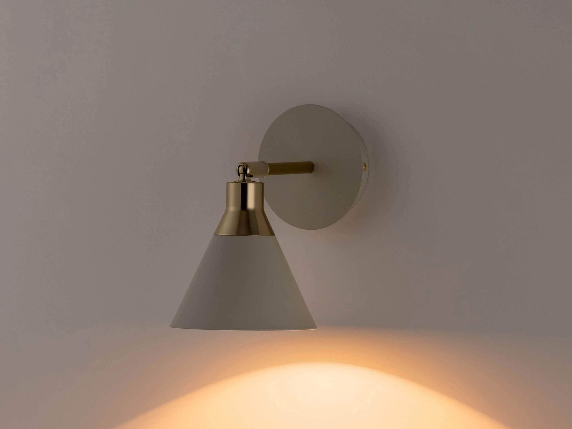 Sand cone wall light