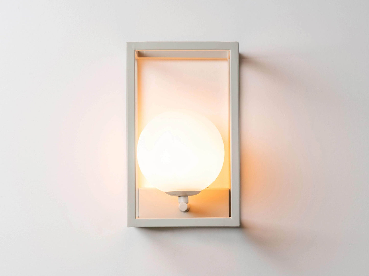 Sand lantern wall light