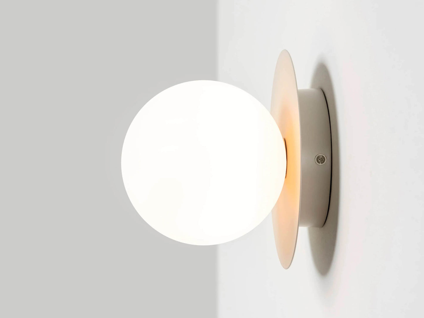 Sand opal disk wall light
