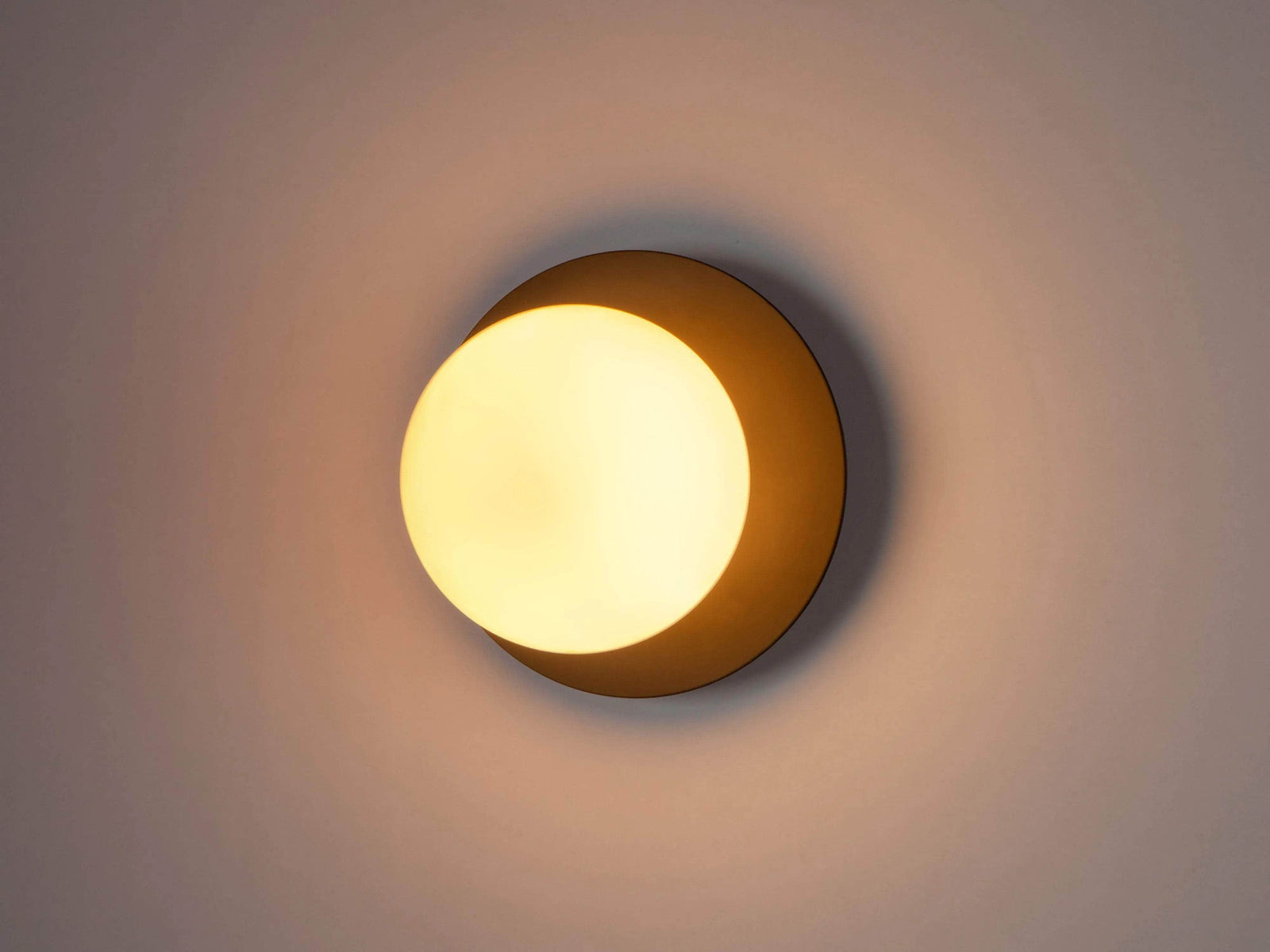 Charcoal grey opal disk wall light