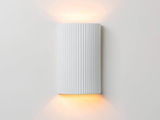 White ribbed ceramic pillar wall light
