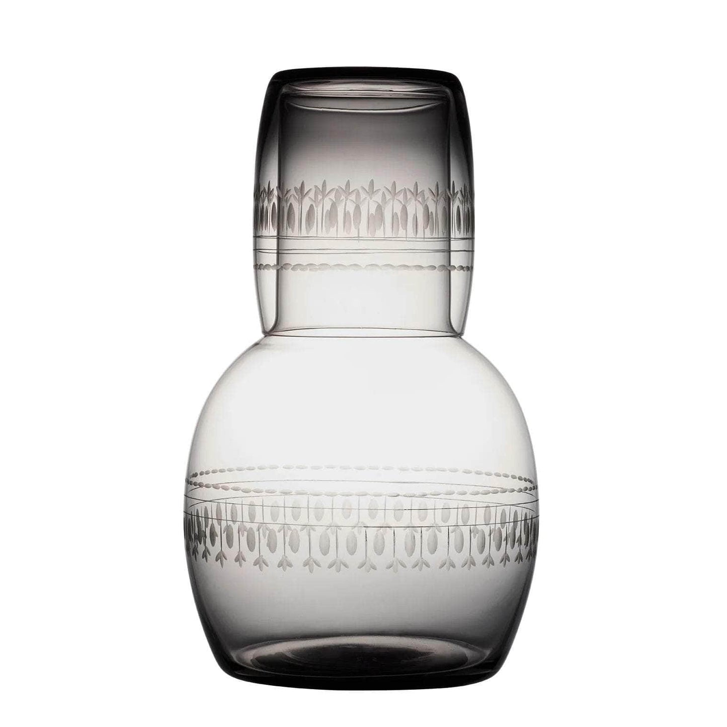 A smoky crystal carafe set with ovals design