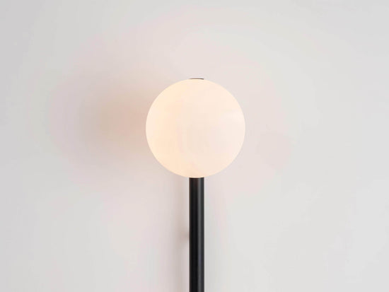 Charcoal grey bar opal ball wall light